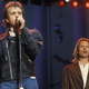 Peter Gabriel and Sting, together at an Amnesty International concert in 1988. (Photo: Getty Images)